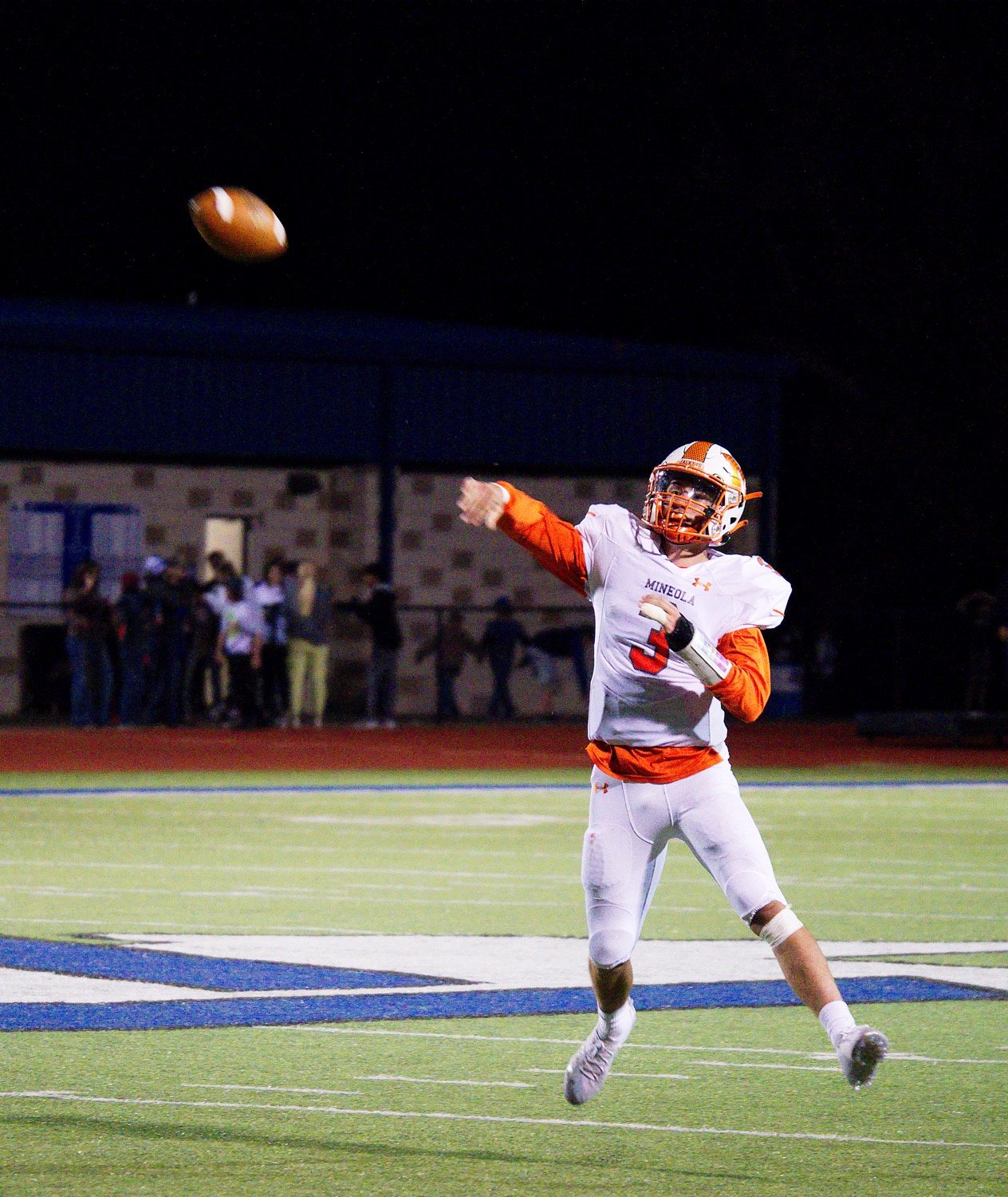 Mineola quarterback T.J. Moreland fires away on one of his 18 pass attempts on the night, 12 of which found Yellowjacket receivers for 154 passing yards. [See more of how Mineola reigned supreme.]